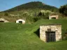Hillside wine cellar entrances in Tokaj